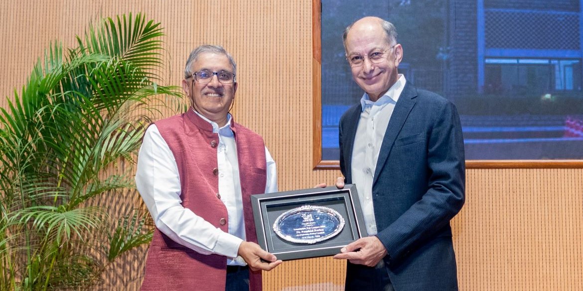 IISER Pune Director Prof. Sunil Bhagwat handing over a memento as a token of our gratitude to Dr. Naushad Forbes
